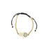 A gold Hamsa hand charm bracelet features sparkling CZ stones and an evil eye accent on an adjustable black cord.