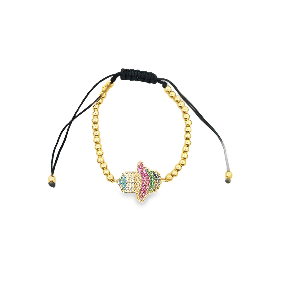 A gold-beaded Hamsa hand charm bracelet with multicolored pavé stones rests on a white background.