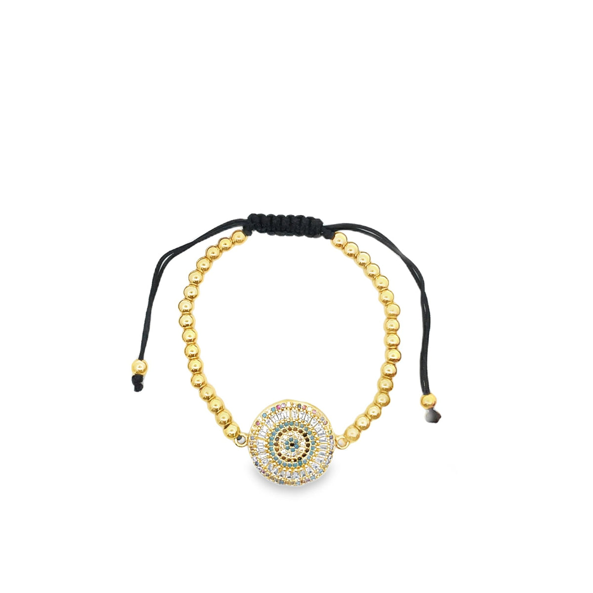A delicate gold beaded bracelet features a sparkling multi-colored evil eye pendant on a black adjustable cord.