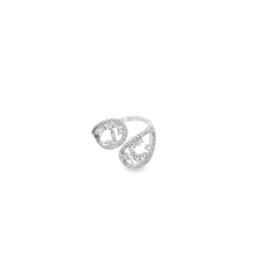 An intricate silver diamond ring rests on a plain white background.