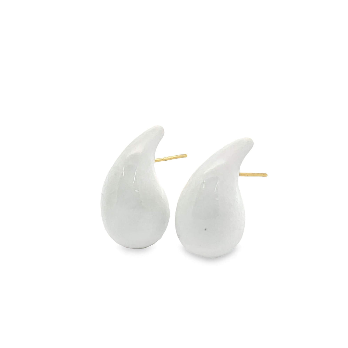 A pair of glossy white teardrop-shaped ceramic stud earrings resting against a clean white background.