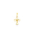 A small gold cross pendant features an intricate filigree design against a plain white background.