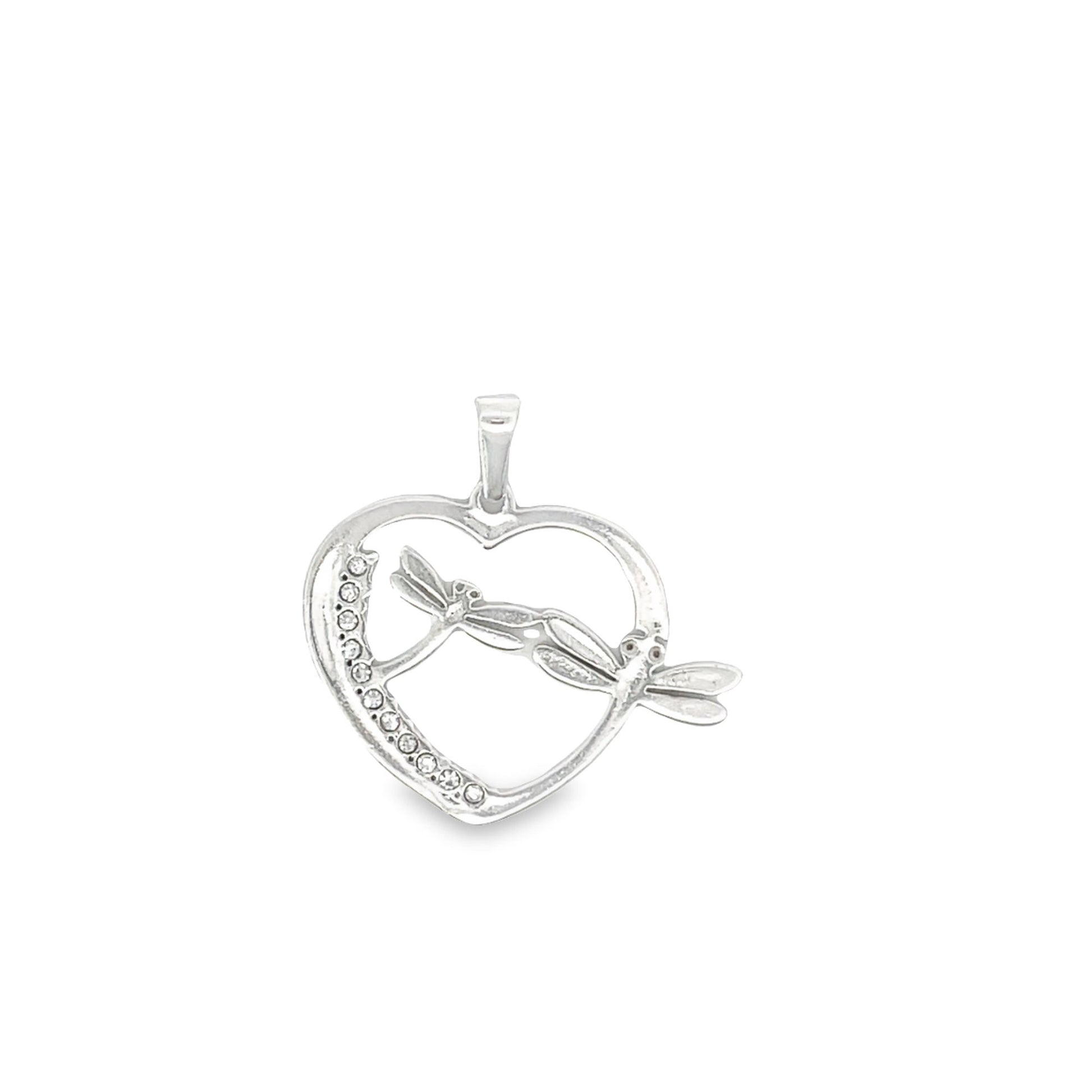 A silver heart pendant features two detailed dragonflies resting inside with sparkling crystals along the curve.