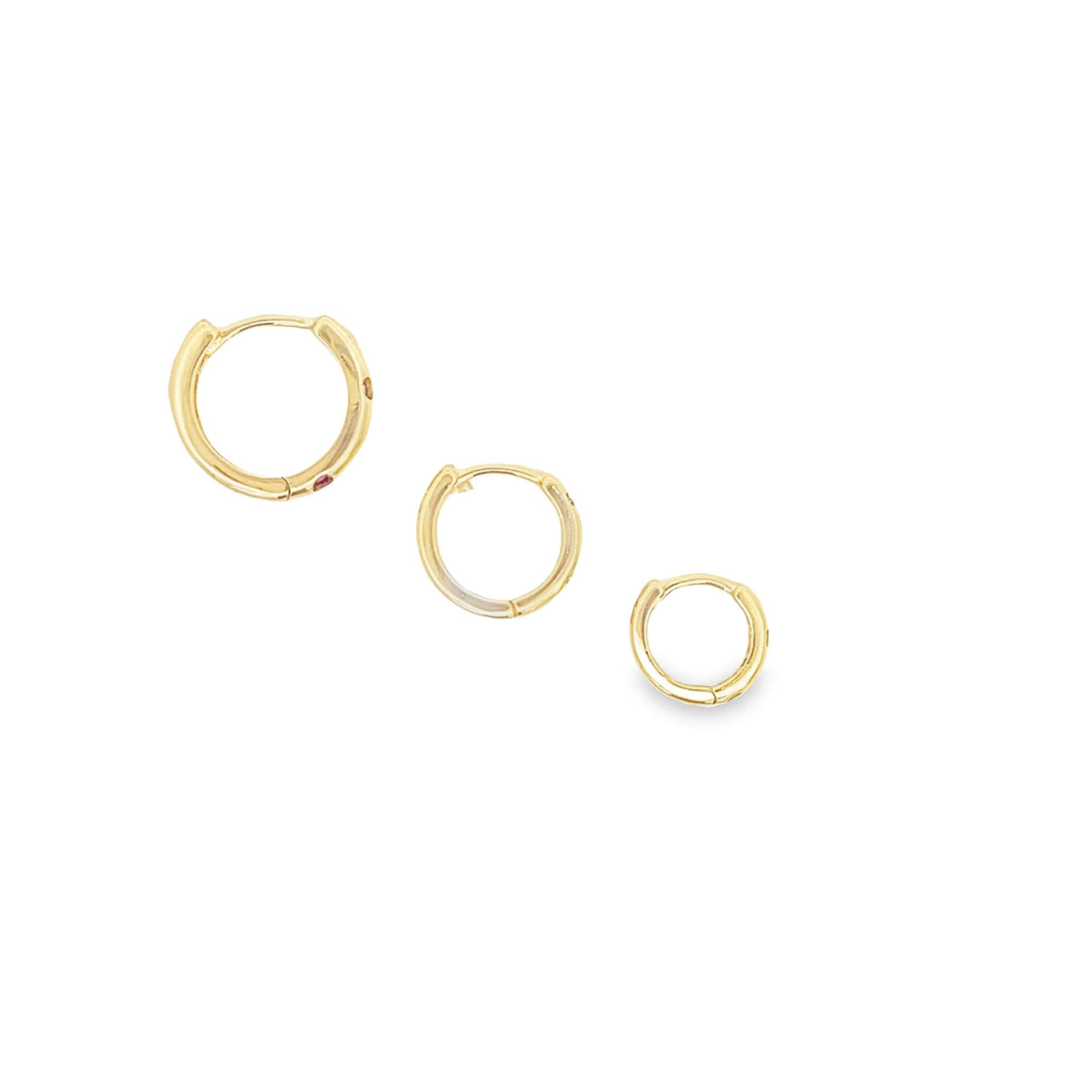 Three graduated gold hoop earrings display a delicate, minimalist design against a clean white background.