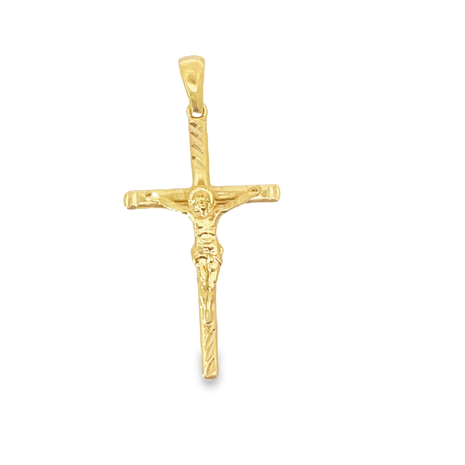 A detailed gold crucifix pendant displays the figure of Jesus on the cross.