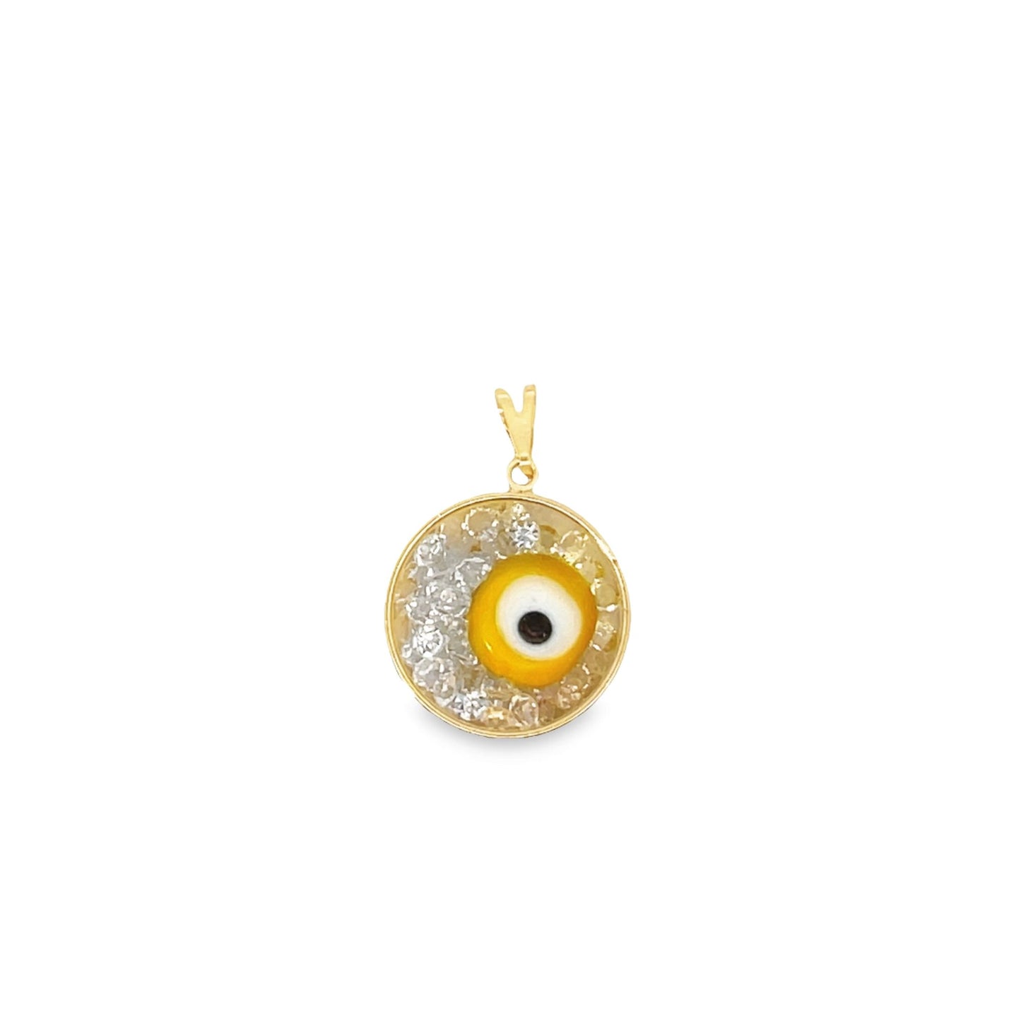 A gold evil eye pendant features a central yellow and white design accented with sparkling crystal fragments against a white background.