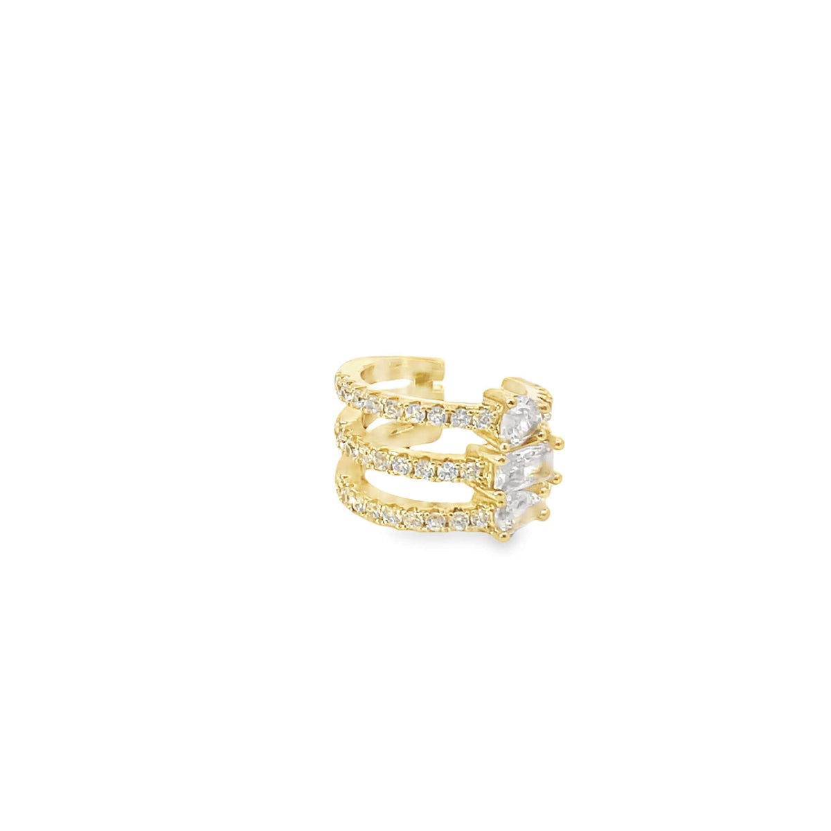A multi-band gold ear cuff sparkles with pave diamonds and three prominent baguette-cut stones.