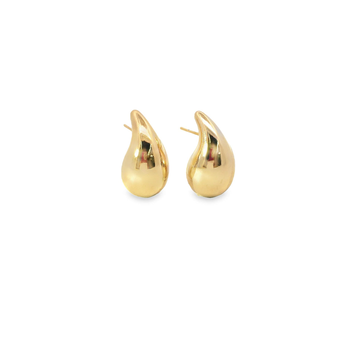 A pair of polished gold teardrop stud earrings sits against a clean white background.