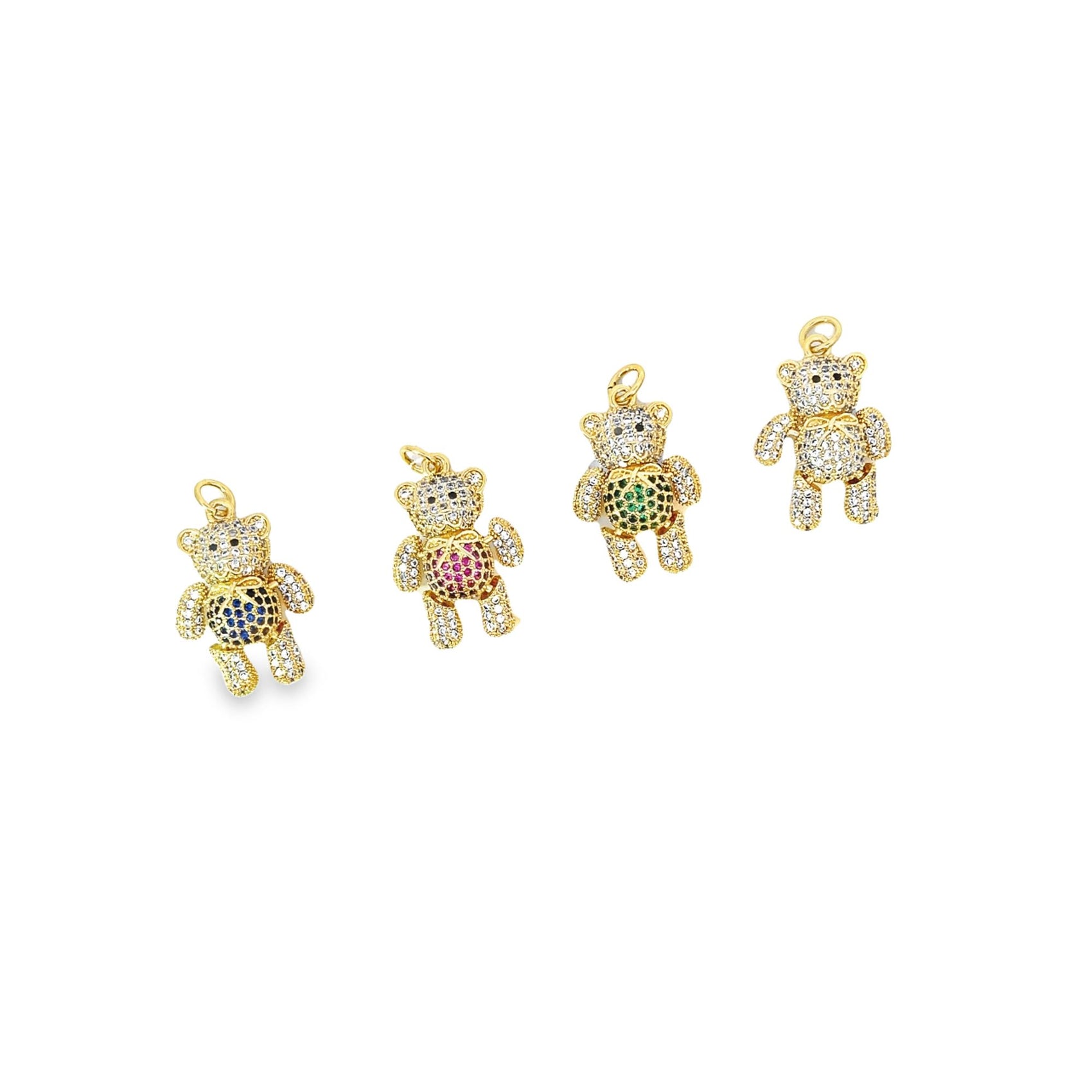 Four sparkling gold teddy bear pendants encrusted with clear and colorful crystal stones line up against a white background.