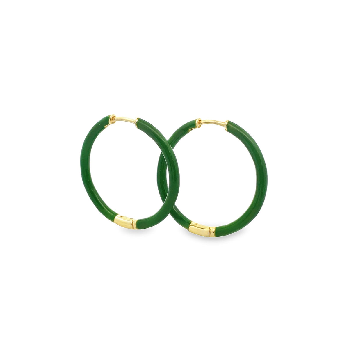 A pair of vibrant green enamel hoop earrings with gold-plated clasps rests against a plain white background.