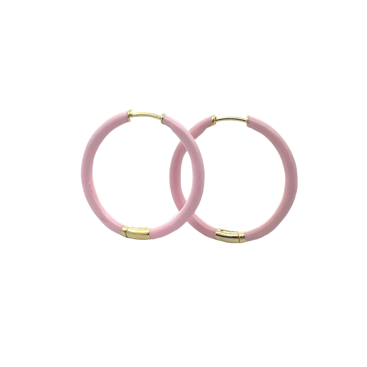 A pair of pink enamel hoop earrings with gold hinges rest against a clean white background.