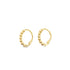 A pair of gold huggie hoop earrings featuring a beaded design sit against a clean white background.