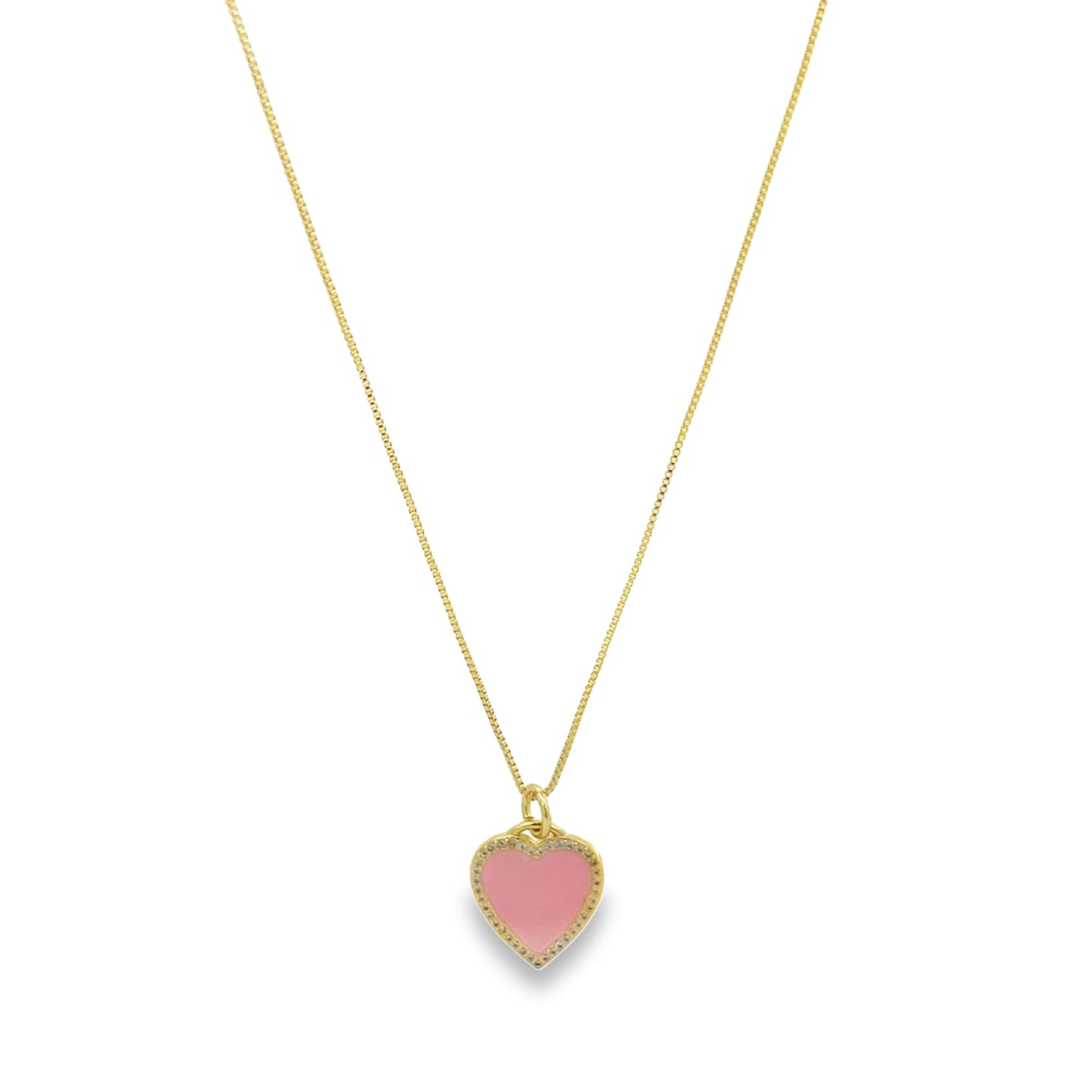 A delicate gold chain necklace dangles, featuring a charming pink enamel heart pendant edged with sparkling pave crystals.