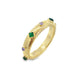 A ribbed yellow gold gemstone bangle bracelet features alternating green and purple stones against a white background.