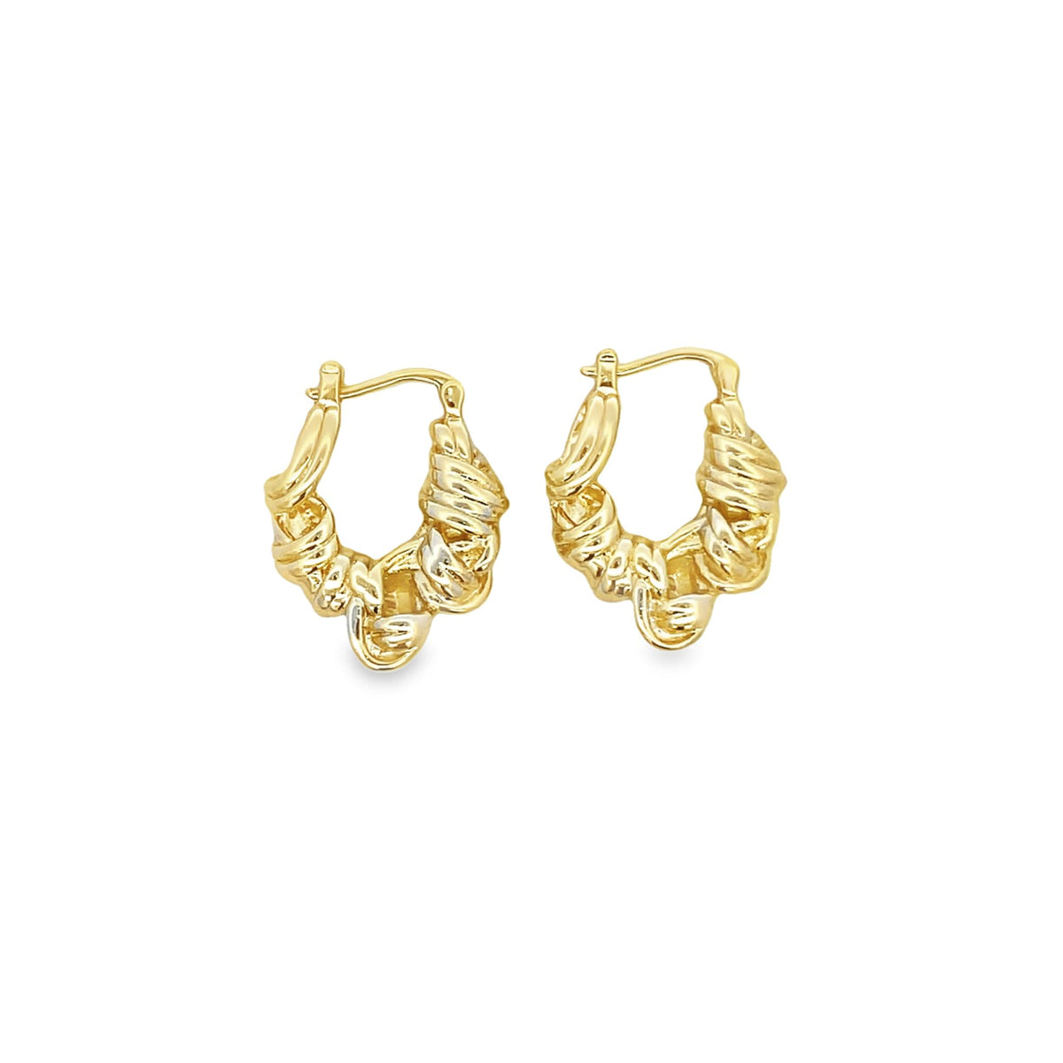 A pair of textured gold hoop earrings display an intricate knot design against a clean white background.