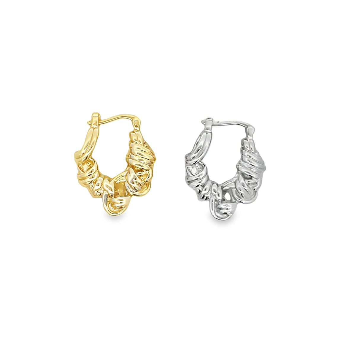A pair of textured, knotted hoop earrings features one gold and one silver design displayed side by side against a white background.