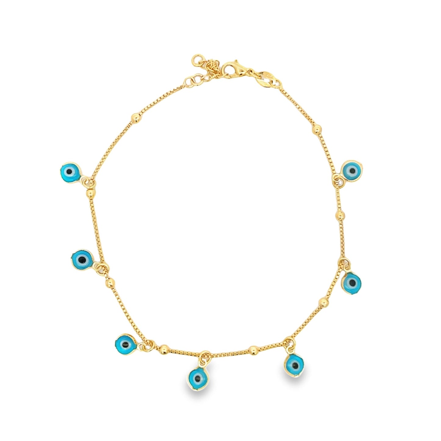 A delicate gold chain bracelet features multiple dangling blue and white evil eye charms against a clean white background.