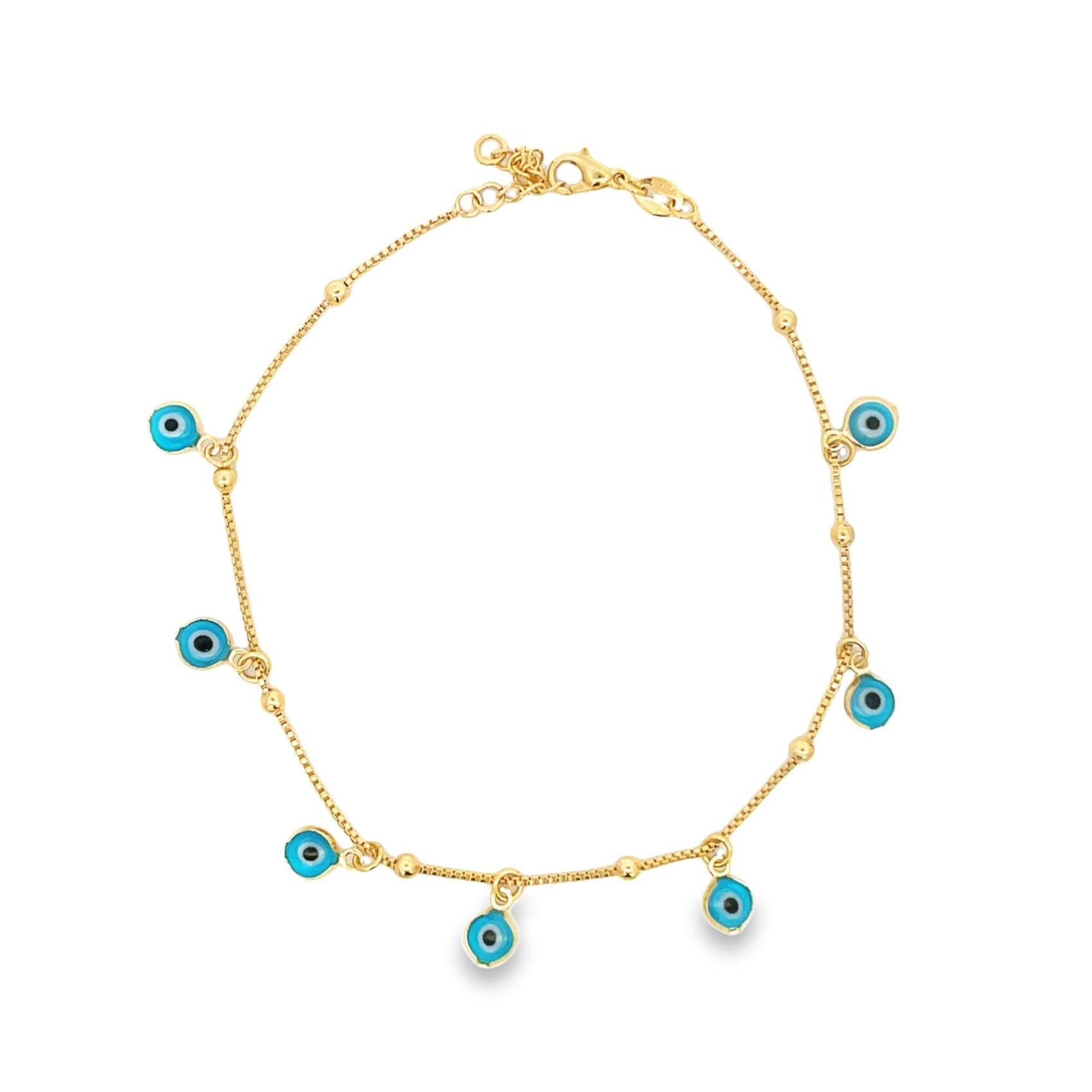 A delicate gold chain bracelet features multiple dangling blue and white evil eye charms against a clean white background.