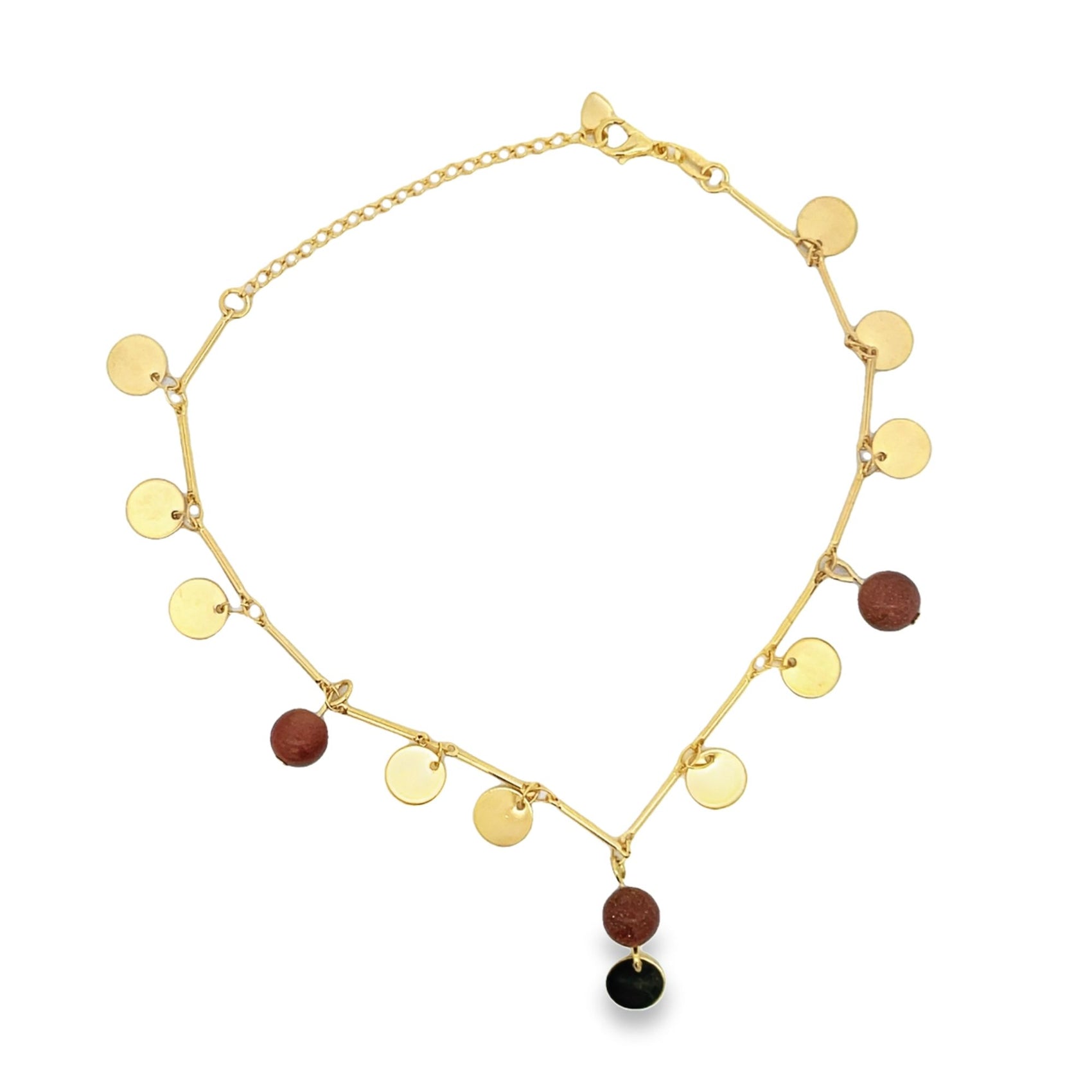 A delicate gold anklet features hanging coin charms and brown stone beads against a white background.