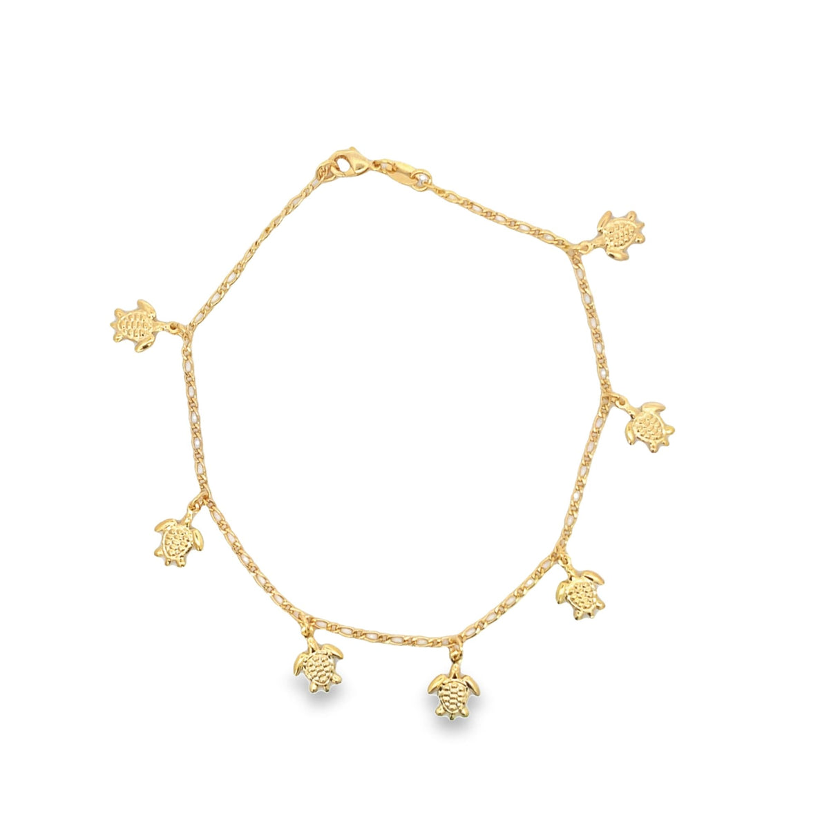 A delicate gold charm bracelet features multiple dangling sea turtle charms against a clean white background.