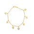 A delicate gold charm bracelet features multiple dangling sea turtle charms against a clean white background.