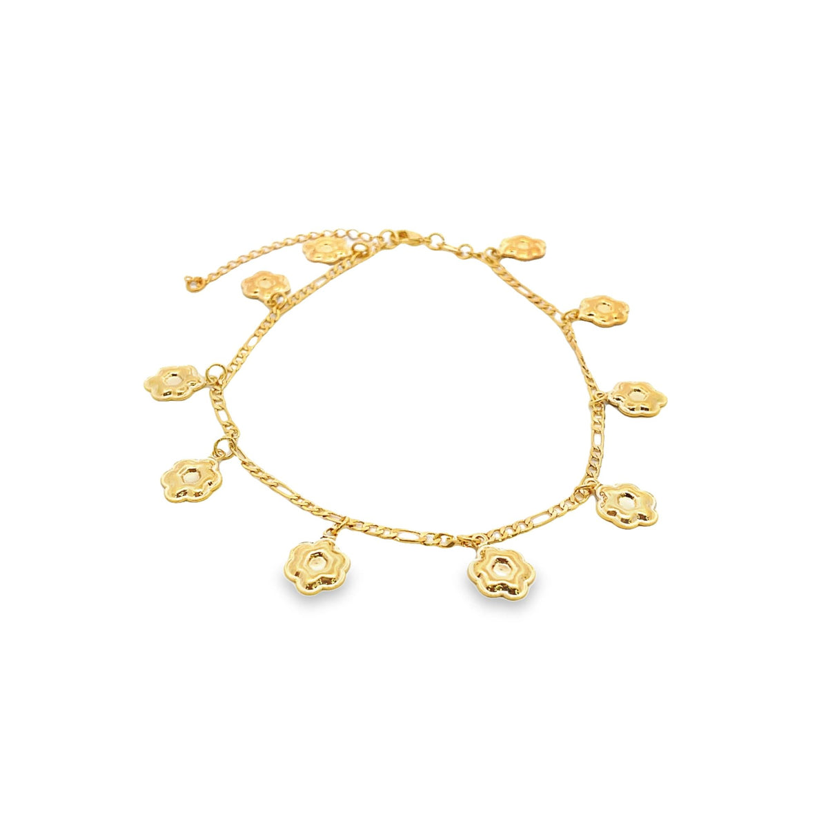 A delicate gold chain anklet dangles multiple charming flower charms against a clean white background.