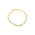 A gold shell anklet features alternating cowrie shell charms and sparkling crystal accents on a delicate chain.