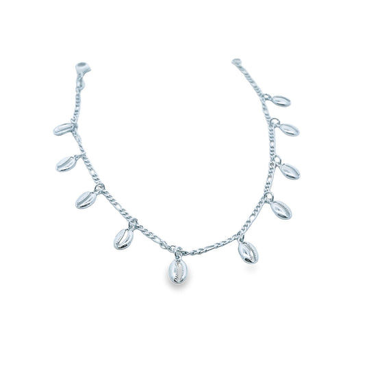 A sterling silver anklet dangles delicately, featuring dangling cowrie shell charms against a clean white background.