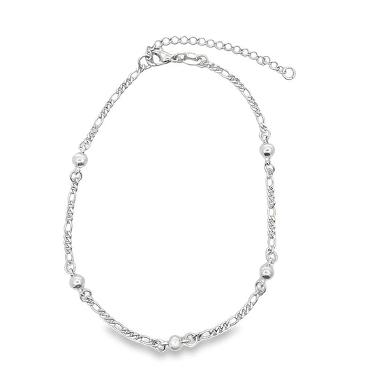 A silver anklet featuring alternating chain links and polished bead accents lies against a clean white background.