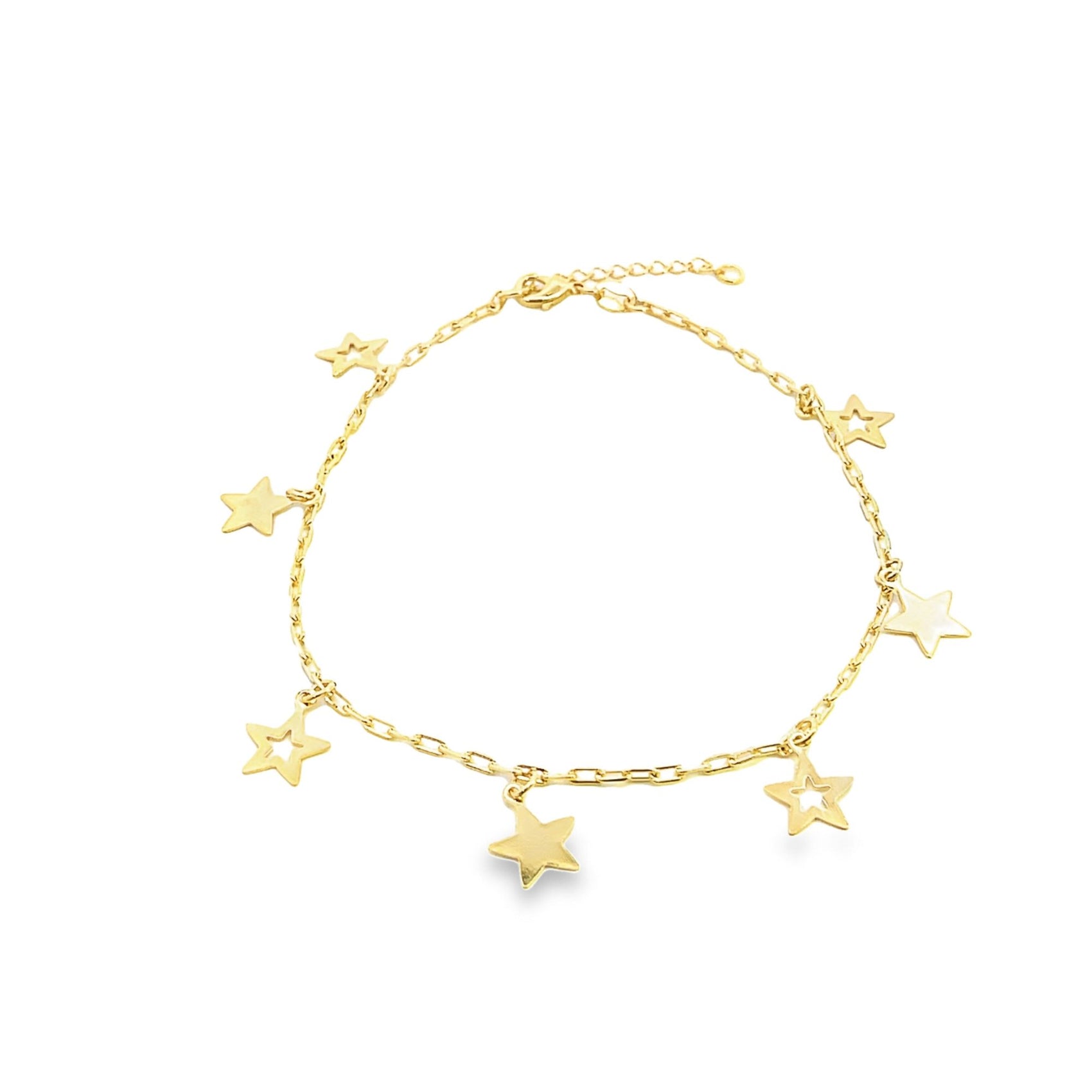 A delicate gold star charm bracelet rests gracefully on a pure white background.