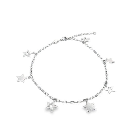 A delicate silver charm anklet features multiple dangling star charms arranged neatly along its dainty chain.