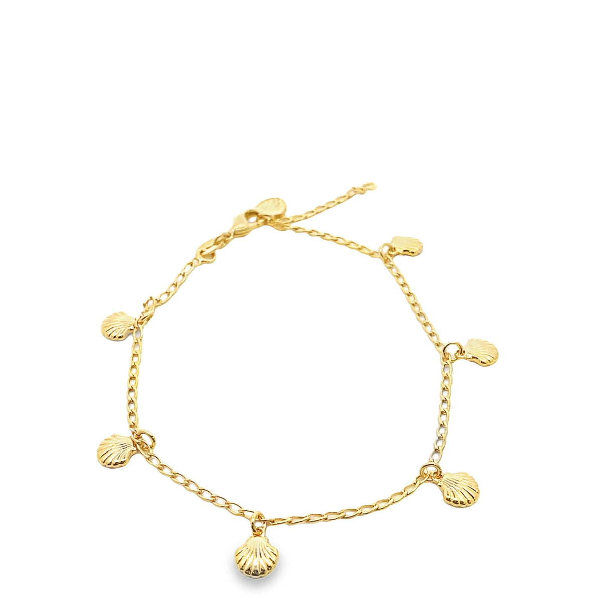 A delicate gold chain bracelet features dangling seashell charms against a clean white background.