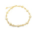 A delicate gold chain bracelet features alternating floral charms against a clean white background.