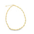 A shiny gold bead chain necklace rests in a circle on a white background.