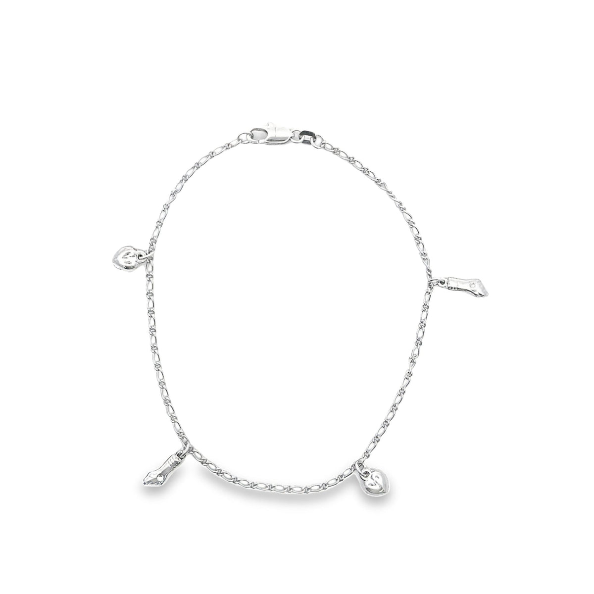 A delicate silver charm bracelet displays dangling heart and shoe charms against a white background.