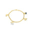 A delicate gold chain bracelet features four dangling elephant charms adorned with colorful enamel.