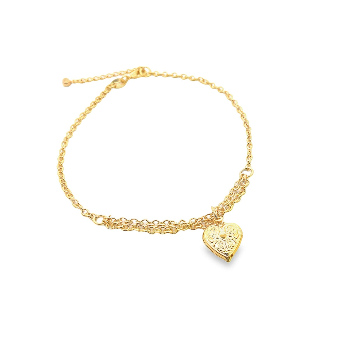 A delicate gold chain bracelet features an ornate heart-shaped locket pendant against a clean white background.