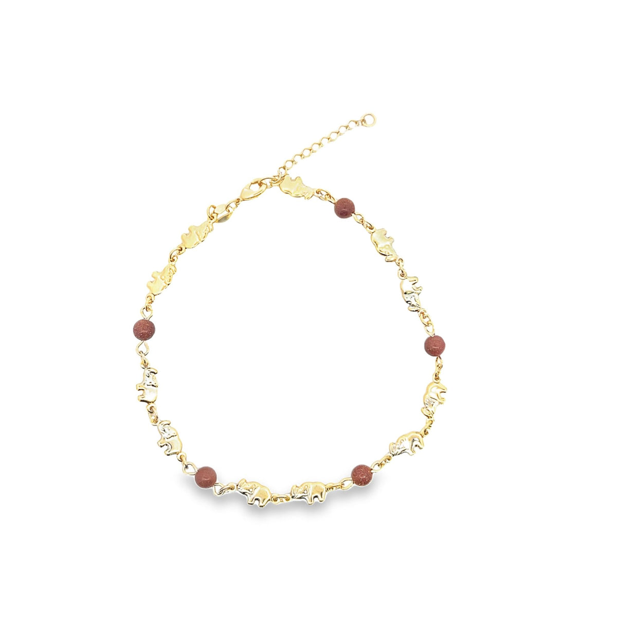 A delicate gold-plated anklet features alternating miniature elephant charms and sparkling brown sandstone beads against a plain white background.