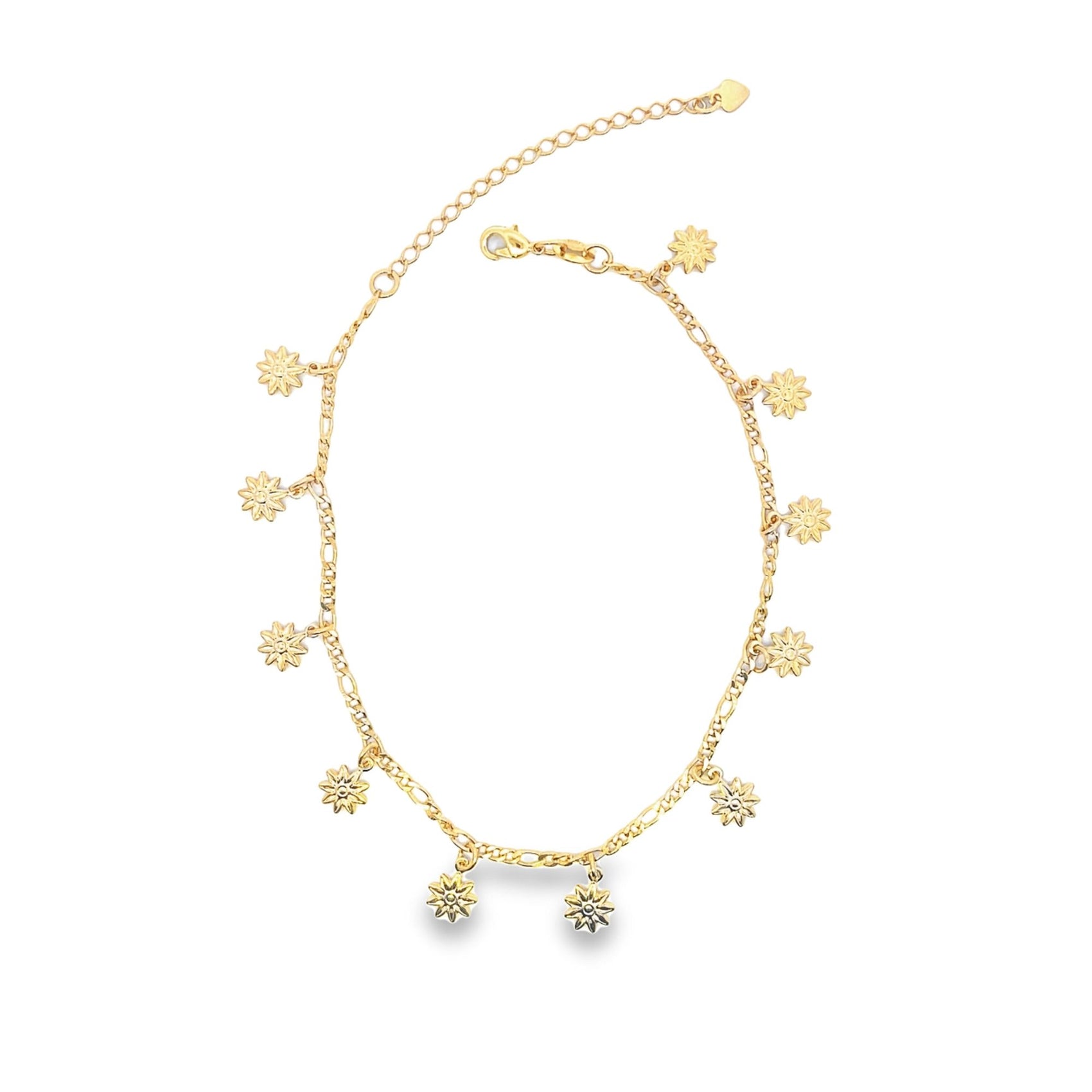 A delicate gold chain anklet dangles multiple small, textured star charms against a clean white background.