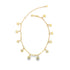 A delicate gold charm anklet displays sparkling sun-shaped pendants along its chain against a clean white background.