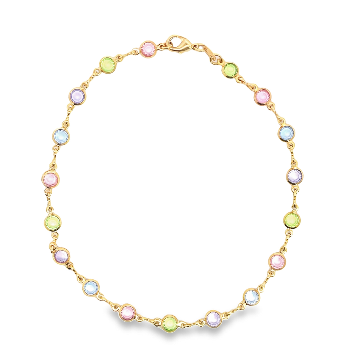 A delicate gold-plated chain necklace displays bezel-set, multi-colored pastel crystals in shades of pink, blue, green, and purple arranged in a circular shape.