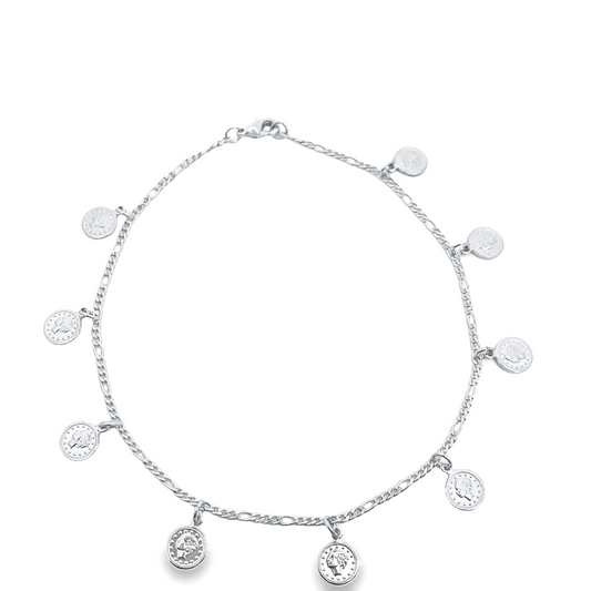 A delicate silver anklet adorned with dangling coin charms sparkles against a clean white background.