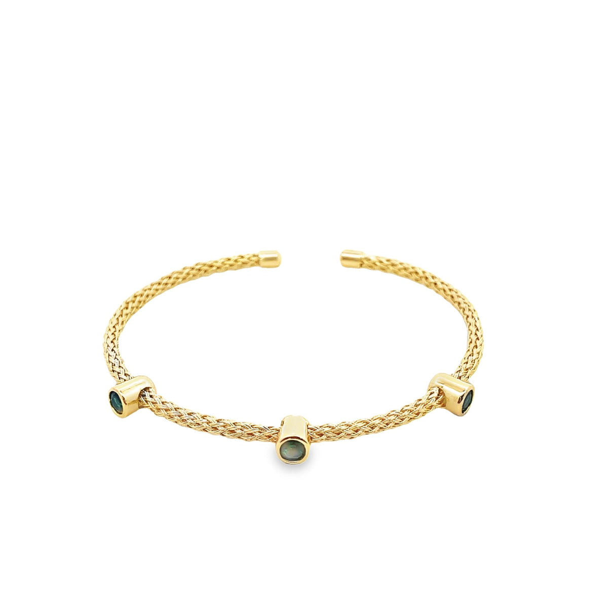 A gold braided cuff bracelet features three bezel-set turquoise gemstones against a plain white background.