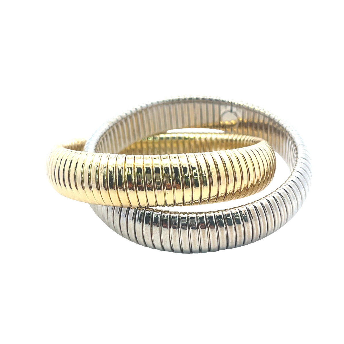 Intertwined gold and silver ribbed flexible tube bracelets rest against a clean white background.