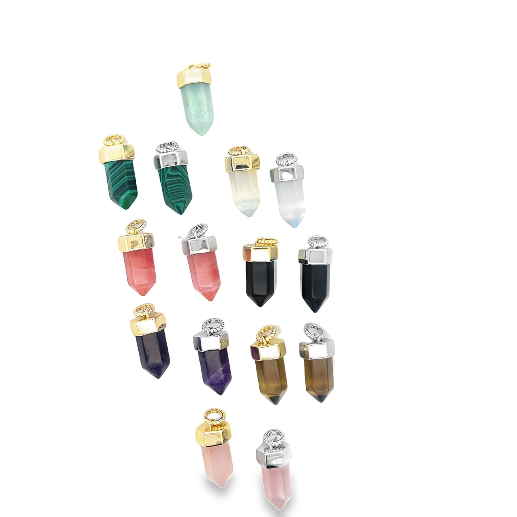 A collection of hexagonal crystal point pendants in various gemstone colors features gold and silver bails arranged neatly on a white background.