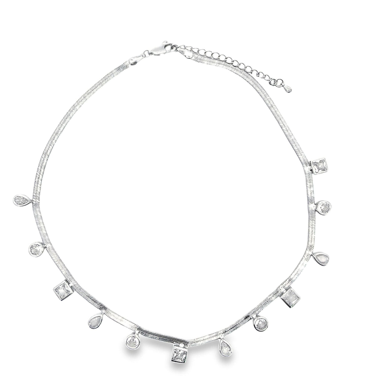 A silver herringbone choker necklace features dangling charms in round, square, and teardrop zirconia stone shapes against a clean white background.