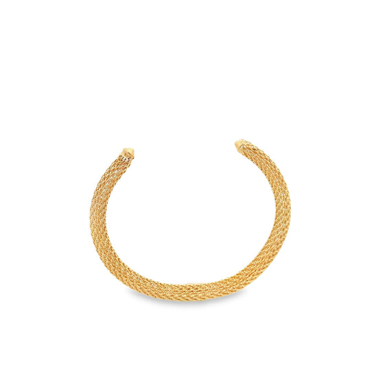 A gold mesh cuff bracelet rests against a clean white background.