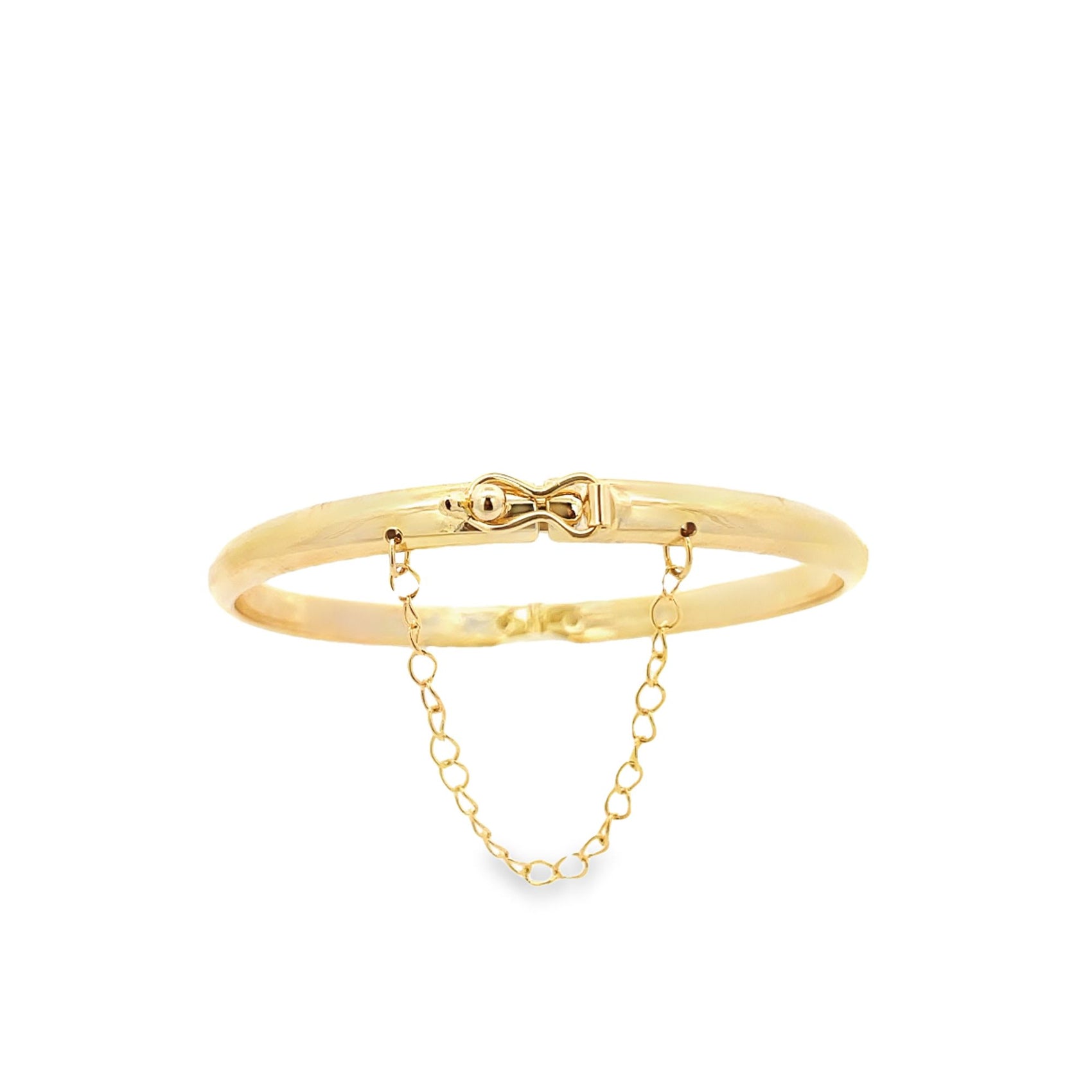 A polished gold safety chain bangle bracelet rests against a clean white background.