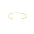 A minimalist gold cuff bracelet rests on a clean white background, showcasing its sleek open design with ball ends.
