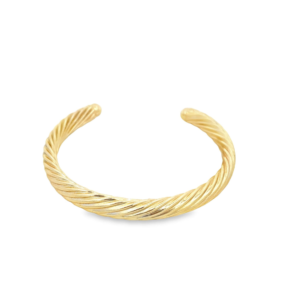 A polished gold cuff bracelet displays a classic twisted cable design against a clean white background.